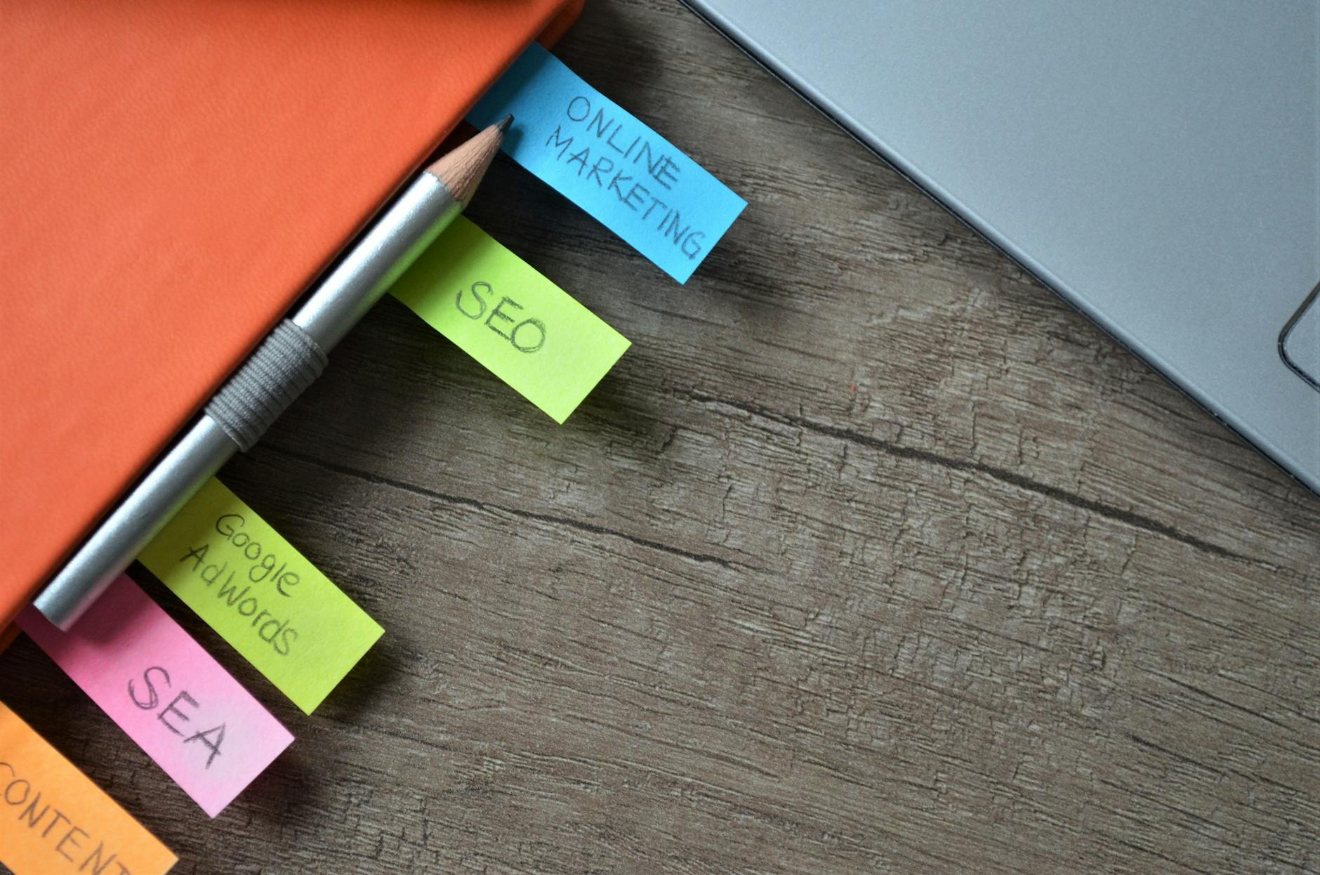 Close-up of SEO strategy planner with colorful sticky notes and a pencil on a notebook. Best Practices for Writing Product Reviews