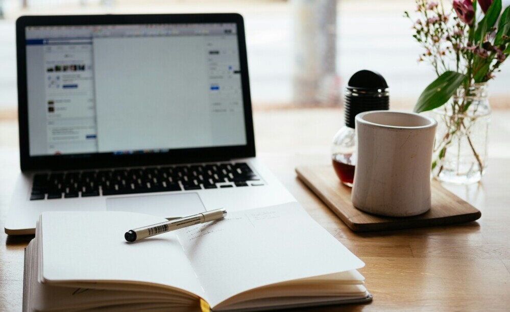 Laptop to create content with the SEO Blog Post Generator (Free AI Tool)